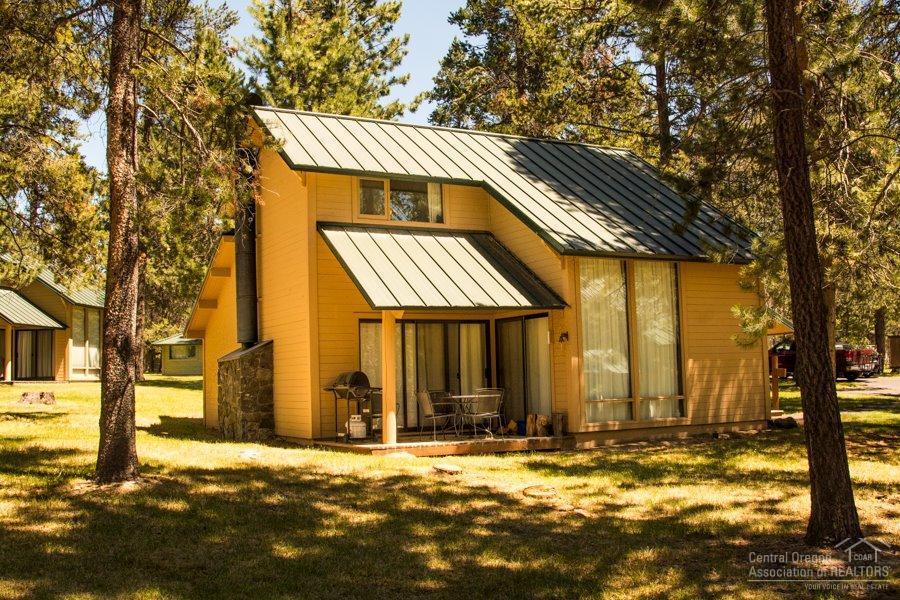 13 Ranch Cabin Road Sunriver, OR 97707 - Photo 2 of 21 a view of a house with a ocean view