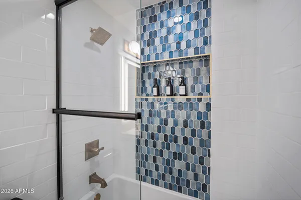 a view of a bathroom with a shower