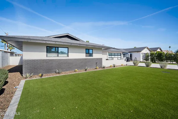 a view of outdoor space yard and front view of a house