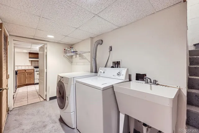 a utility room with dryer and washer