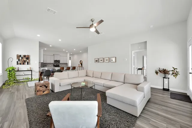 a living room with furniture and a couch