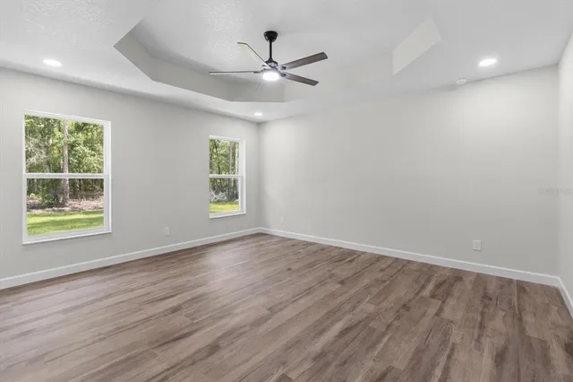 a bathroom with a granite countertop sink a mirror and a