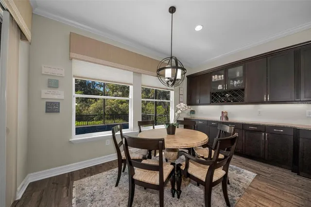 a bedroom with bed and a workspace