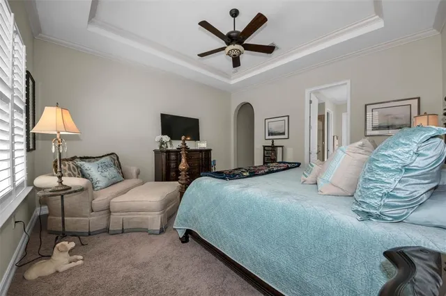 a view of a patio with a table chairs and a backyard