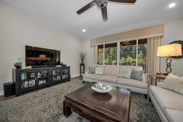 a view of a livingroom with furniture and window