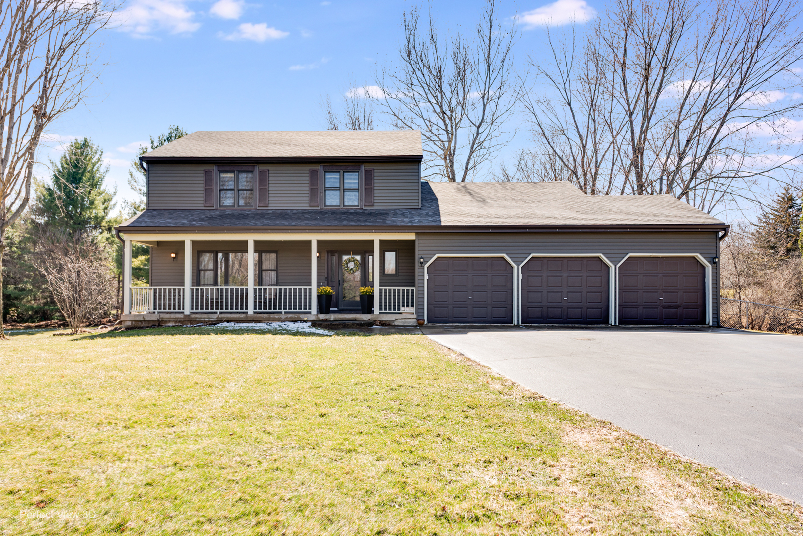 37W765 Spring Green Way Batavia, IL 60510 - Photo 2 of 29 a front view of a house with a yard and garage