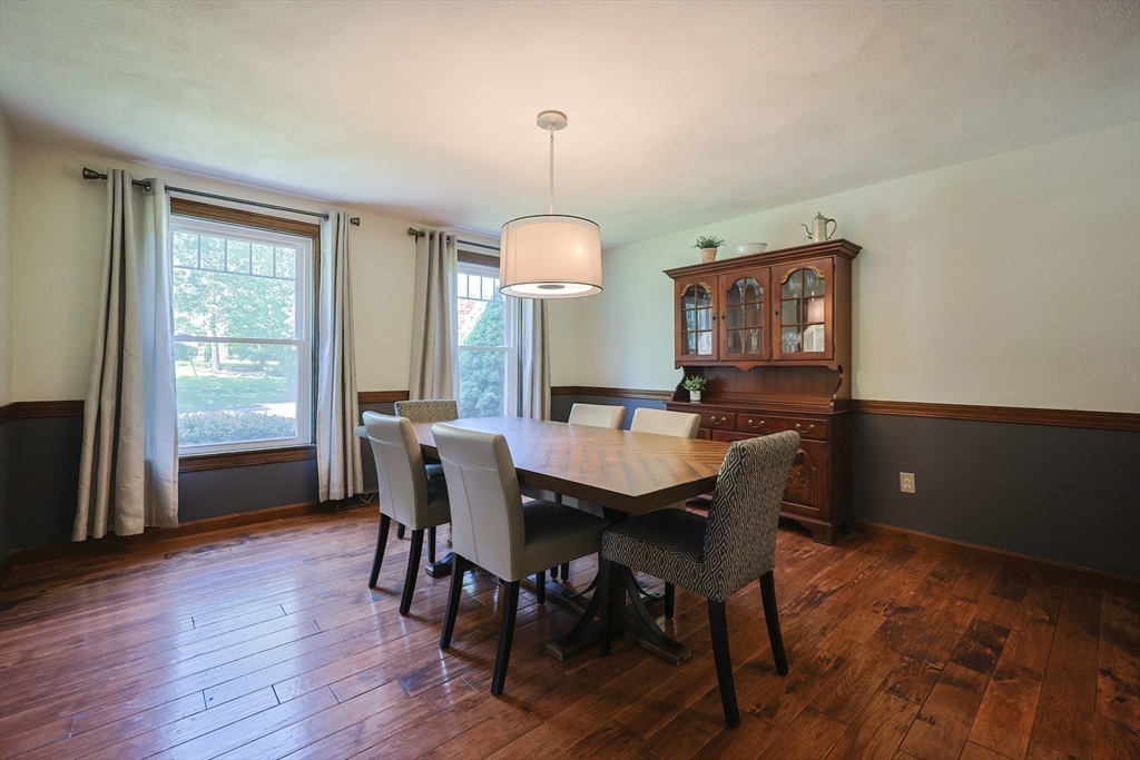 5 Windsor Road Lynnfield, MA 01940 - Photo 9 of 40 a view of a dining room with furniture window and wooden floor
