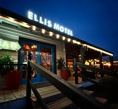 a room with lots of potted plants