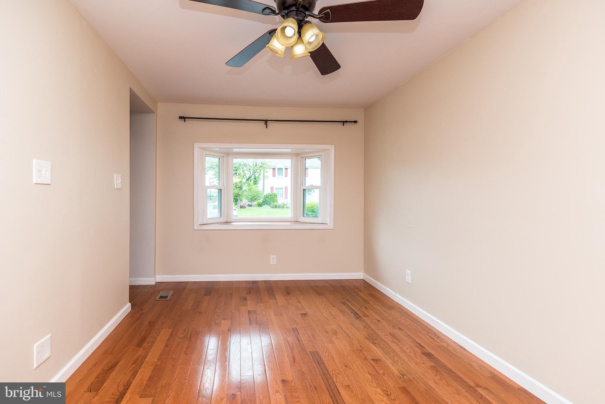 1425 Leedom Road Havertown, PA 19083 - Photo 18 of 46 wooden floor in an empty room with a window