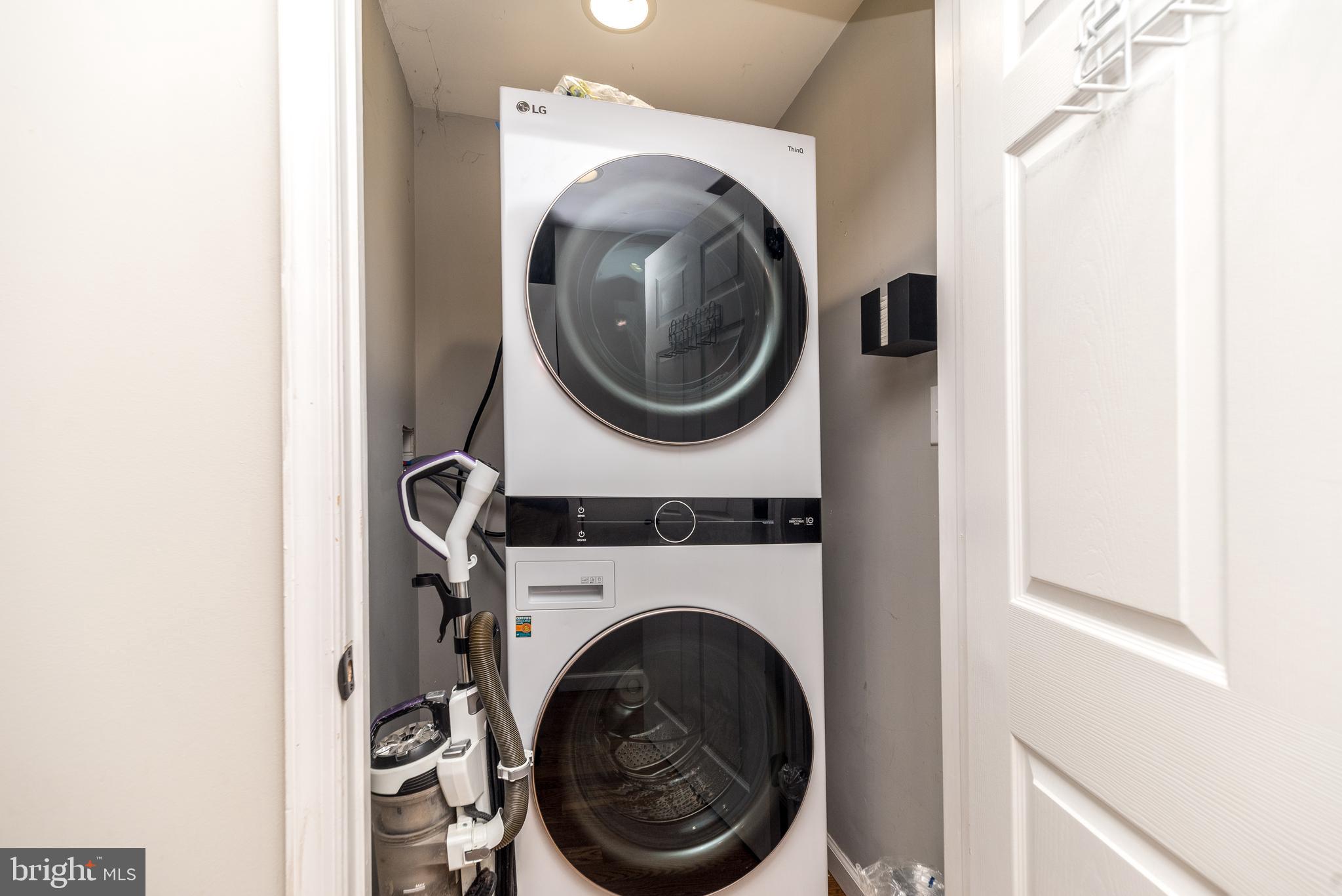 1425 Leedom Road Havertown, PA 19083 - Photo 26 of 46 a view of a hallway with washer and dryer
