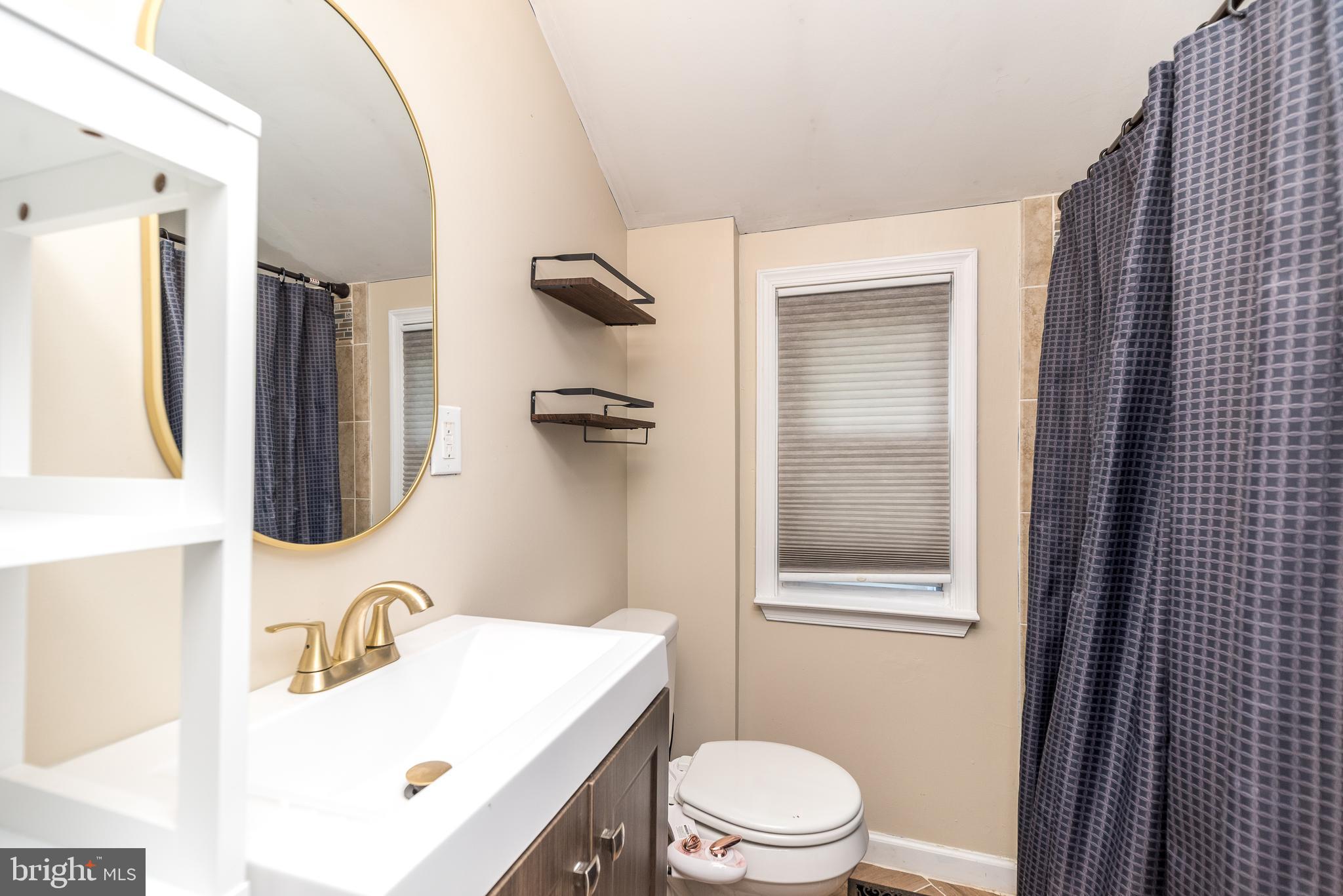 1425 Leedom Road Havertown, PA 19083 - Photo 33 of 46 a bathroom with a sink toilet and shower