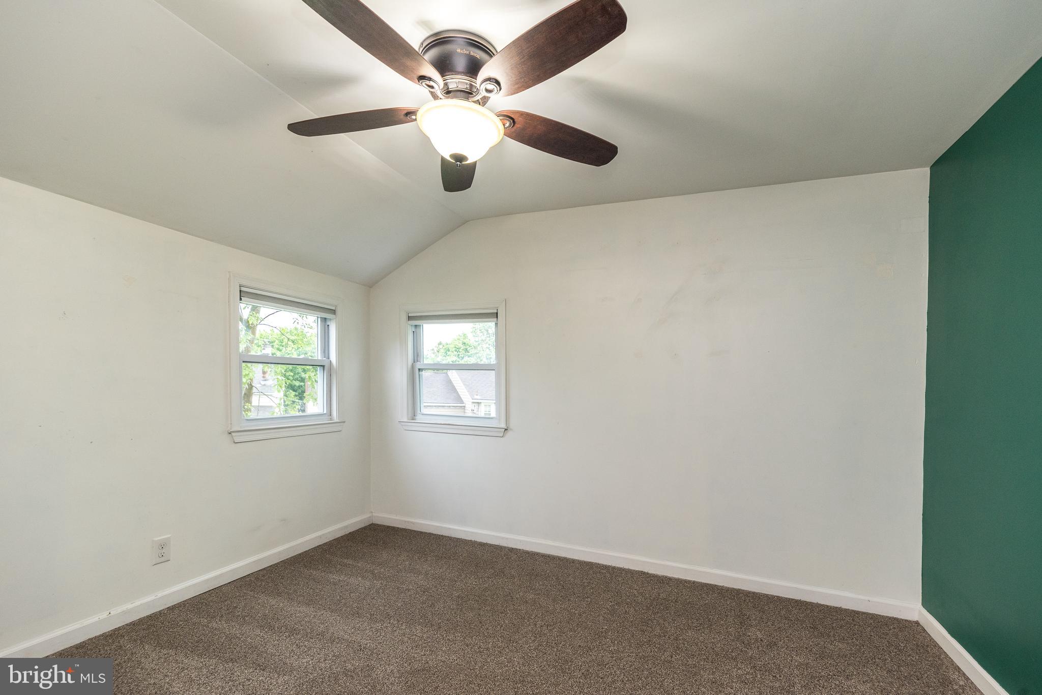 1425 Leedom Road Havertown, PA 19083 - Photo 34 of 46 en empty room with windows and ceiling fan