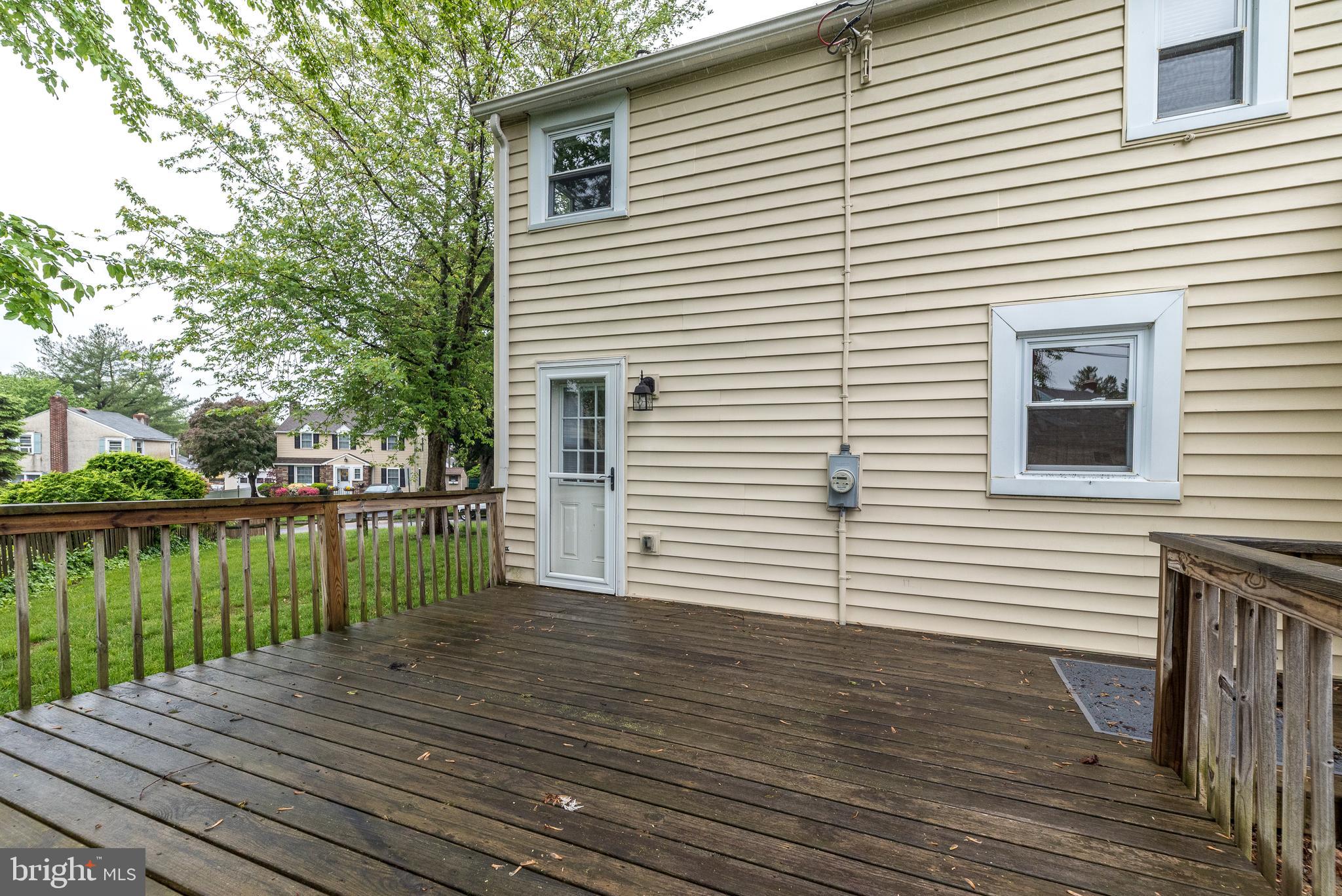 1425 Leedom Road Havertown, PA 19083 - Photo 42 of 46 a view of a roof deck with wooden floor and lake view