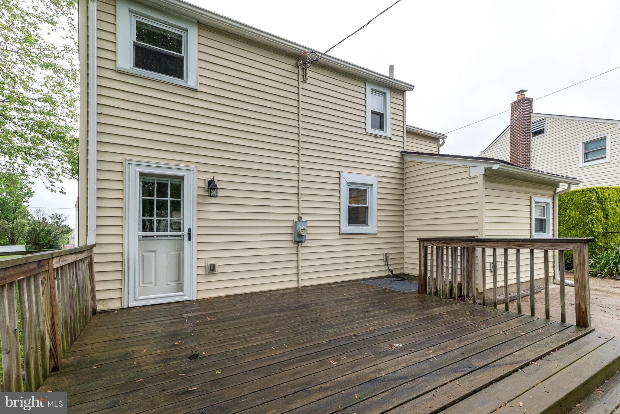 1425 Leedom Road Havertown, PA 19083 - Photo 43 of 46 a view of a house with wooden deck