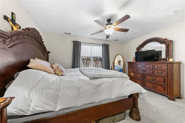 a bathroom with a sink a double vanity and a mirror