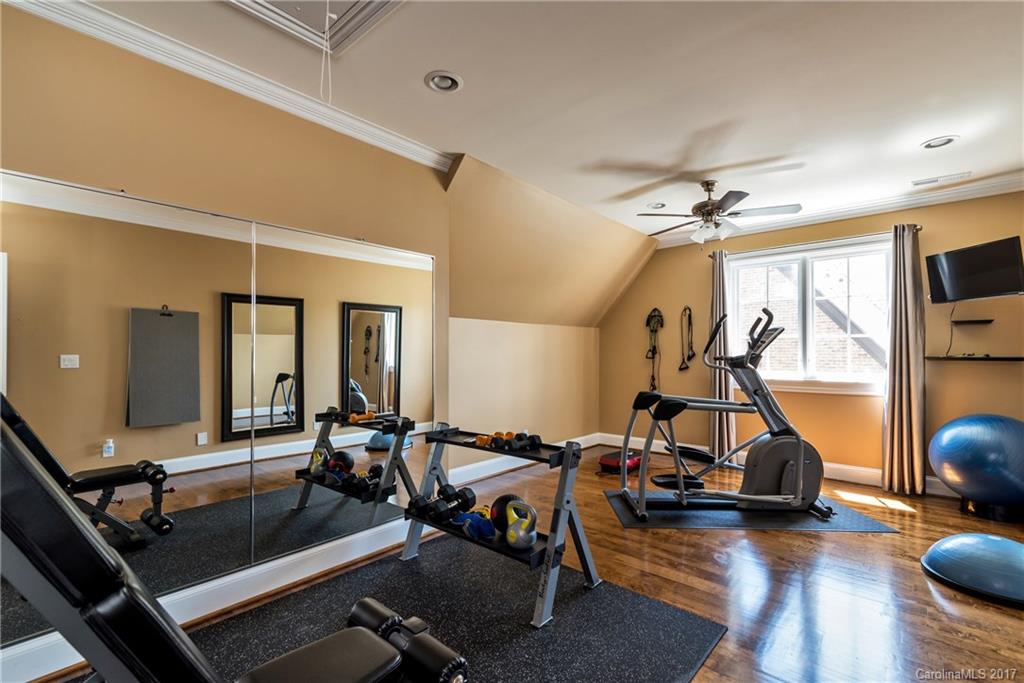 204 Eagle Bend Drive Waxhaw, NC 28173 - Photo 17 of 24 a view of a room with gym equipment