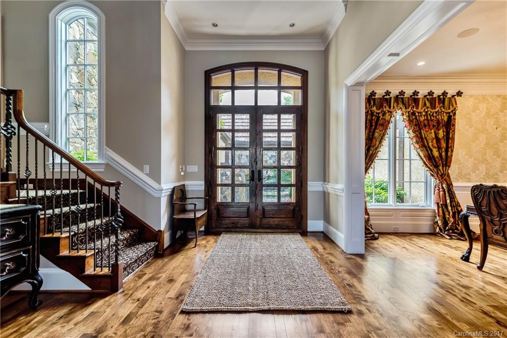 204 Eagle Bend Drive Waxhaw, NC 28173 - Photo 3 of 24 a view of front door with wooden floor and a rug