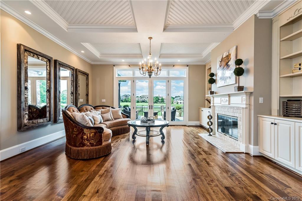 204 Eagle Bend Drive Waxhaw, NC 28173 - Photo 4 of 24 a living room with fireplace furniture and a large window
