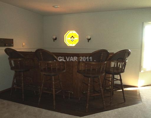 3171 Westwind Road Las Vegas, NV 89146 - Photo 5 of 23 Den. Family Room w/ Bar.