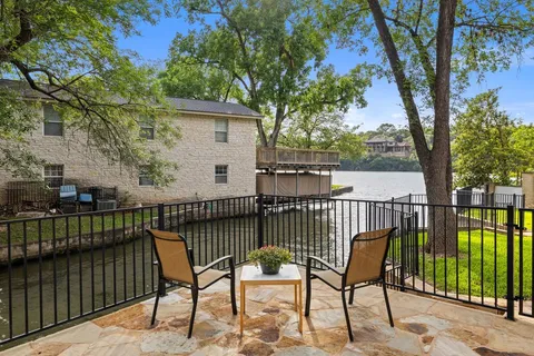 a view of a chairs on the roof deck