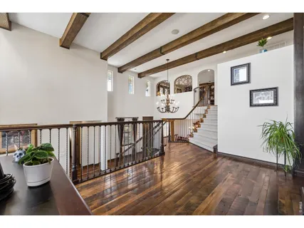 a view of staircase with a rug
