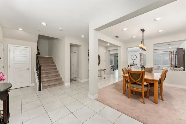 a view of a dining room with furniture