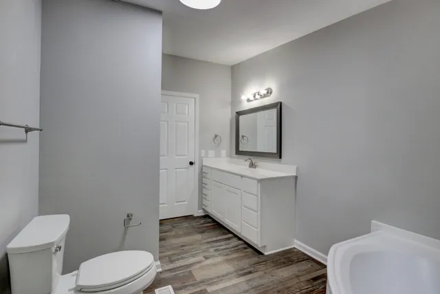 a view of a room with racks on the wall