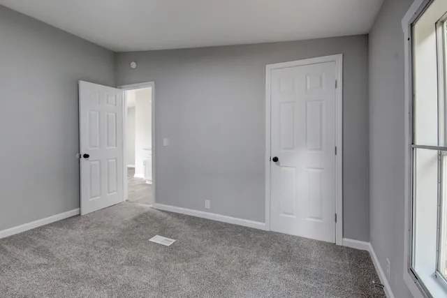 an empty room with a window