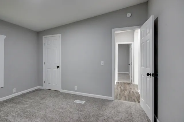 a view of a backyard of the house