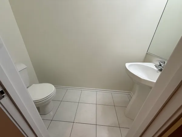 a bathroom with a sink and toilet