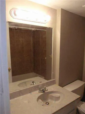 a view of a room with walk in closet with wooden floor