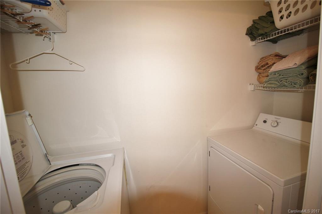 8254 Rudolph Road Charlotte, NC 28216 - Photo 22 of 24 a utility room with dryer and washer