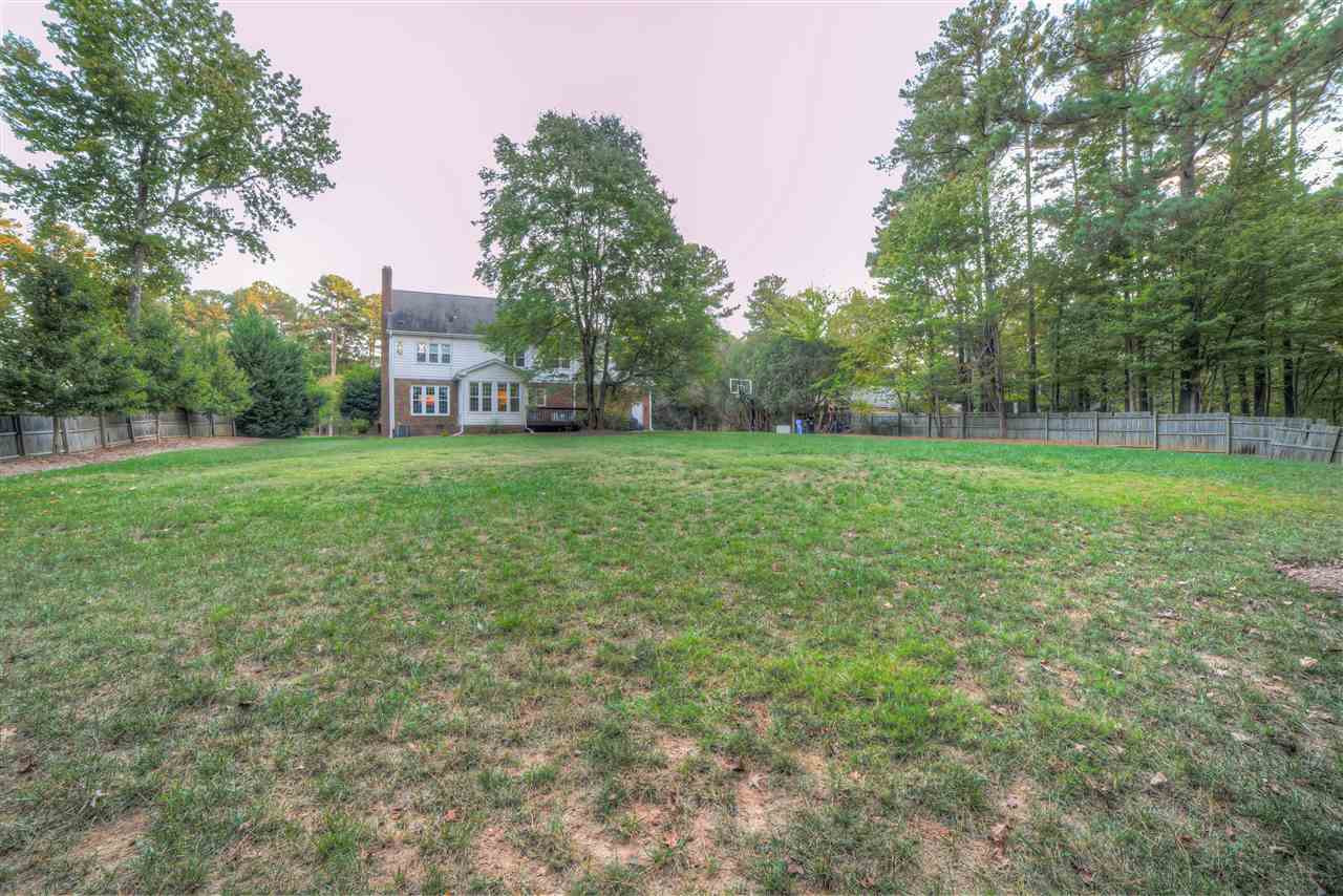 5228 Caber Road Raleigh, NC 27613 - Photo 25 of 25 Look at this huge beautiful backyard. Excellent for playing, entertaining and enjoying outside. Backyard