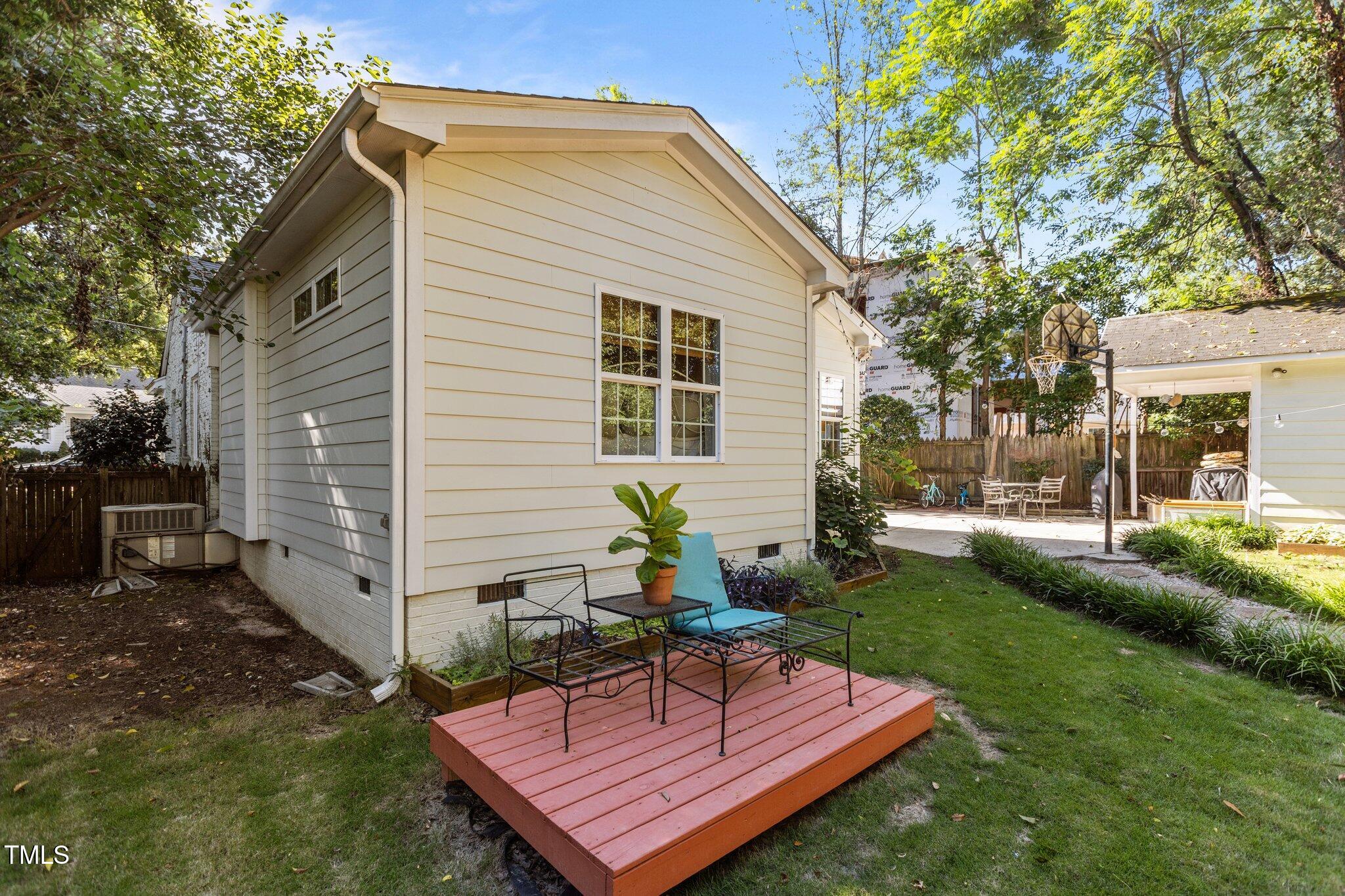1811 Ridley Street Raleigh, NC 27608 - Photo 44 of 48 a view of a backyard with sitting area