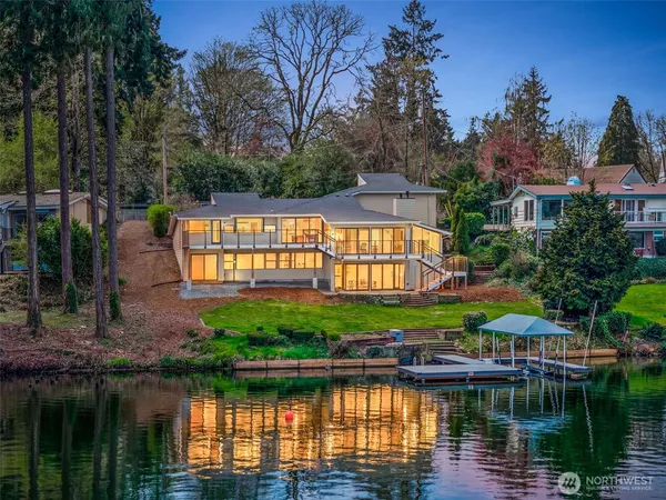 a small pool table and chairs