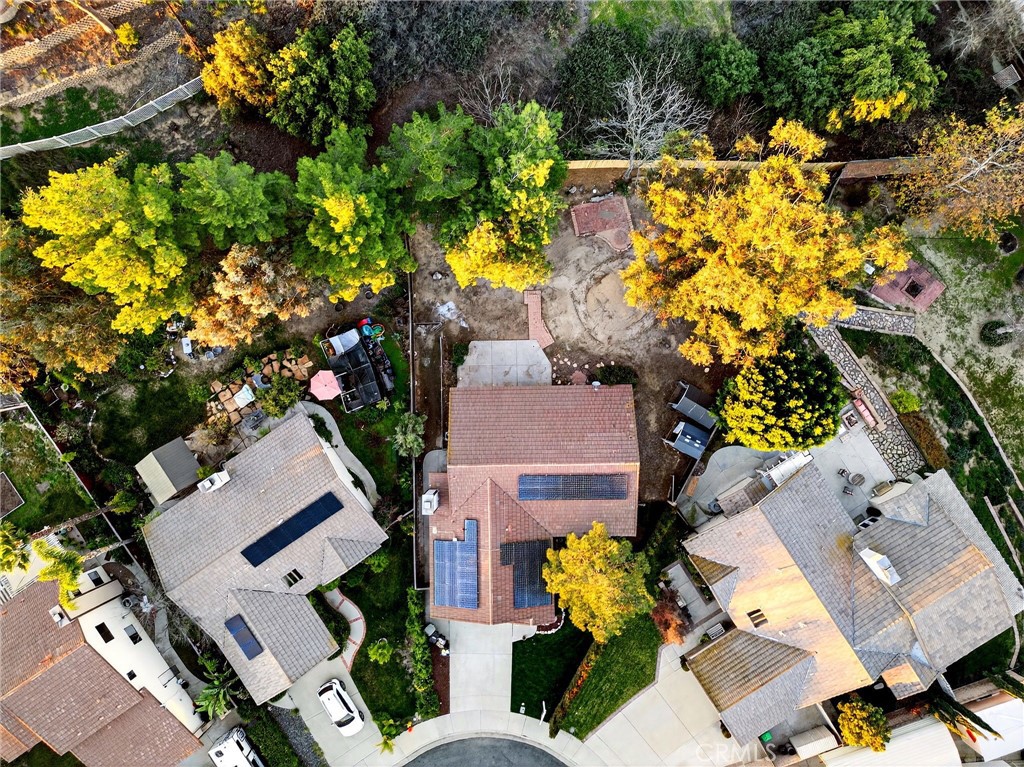 32042 Merlot Court Temecula, CA 92591 - Photo 42 of 46 an aerial view of a house with a yard and a garden