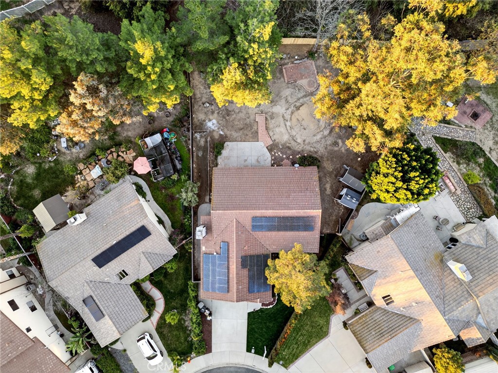 32042 Merlot Court Temecula, CA 92591 - Photo 44 of 46 an aerial view of a house with a yard and garden