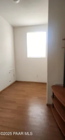 a bathroom with a sink a mirror and a window