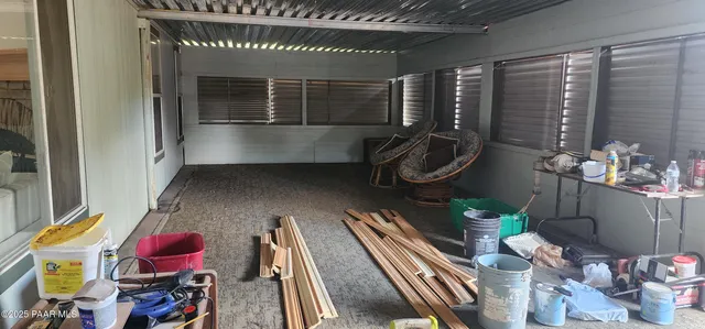 a view of a yard covered in snow