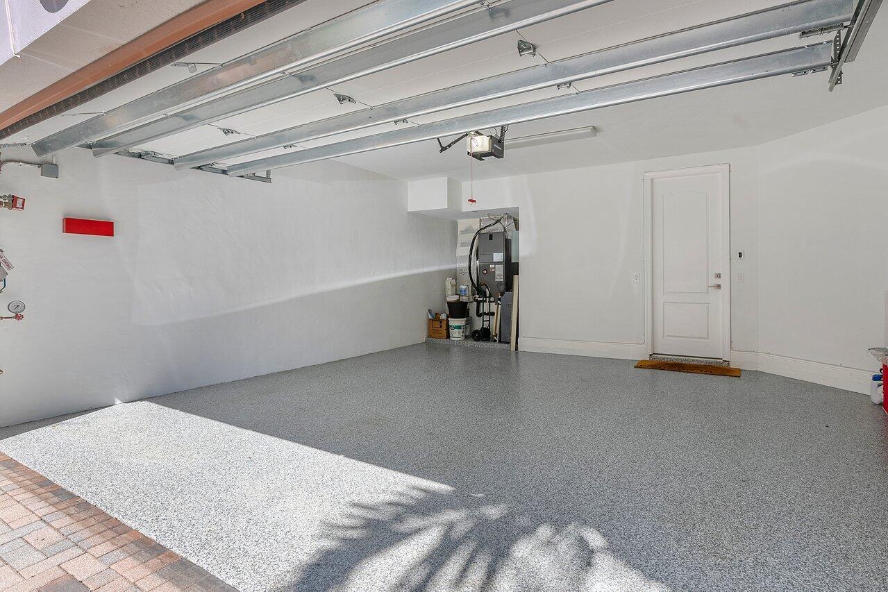617 Northeast Francesca Lane Boca Raton, FL 33487 - Photo 34 of 52 2 Car Apoxy Flooring in Garage
