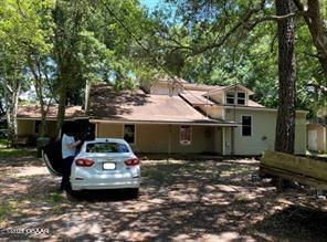 4580 Ave D St. Augustine, FL 32095 - Photo 1 of 10 a car parked in front of a house