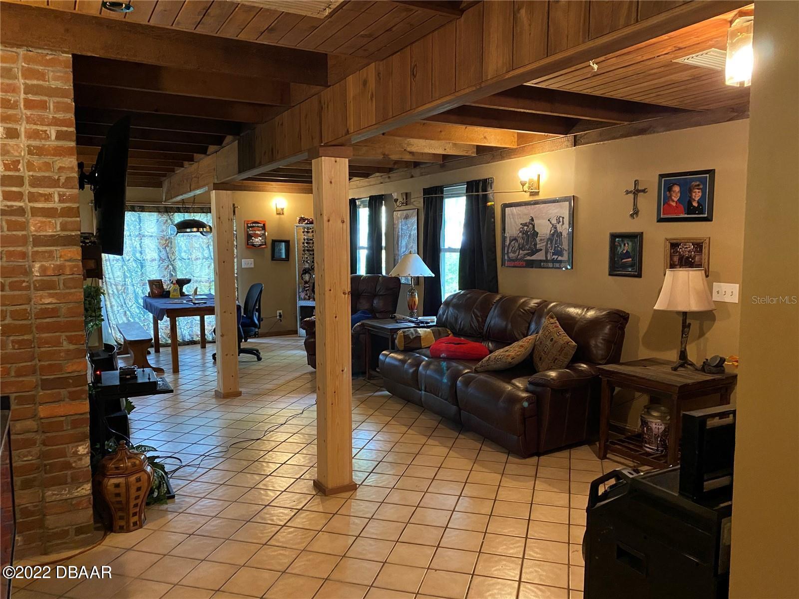 4580 Ave D St. Augustine, FL 32095 - Photo 3 of 10 a living room with furniture and wooden floor