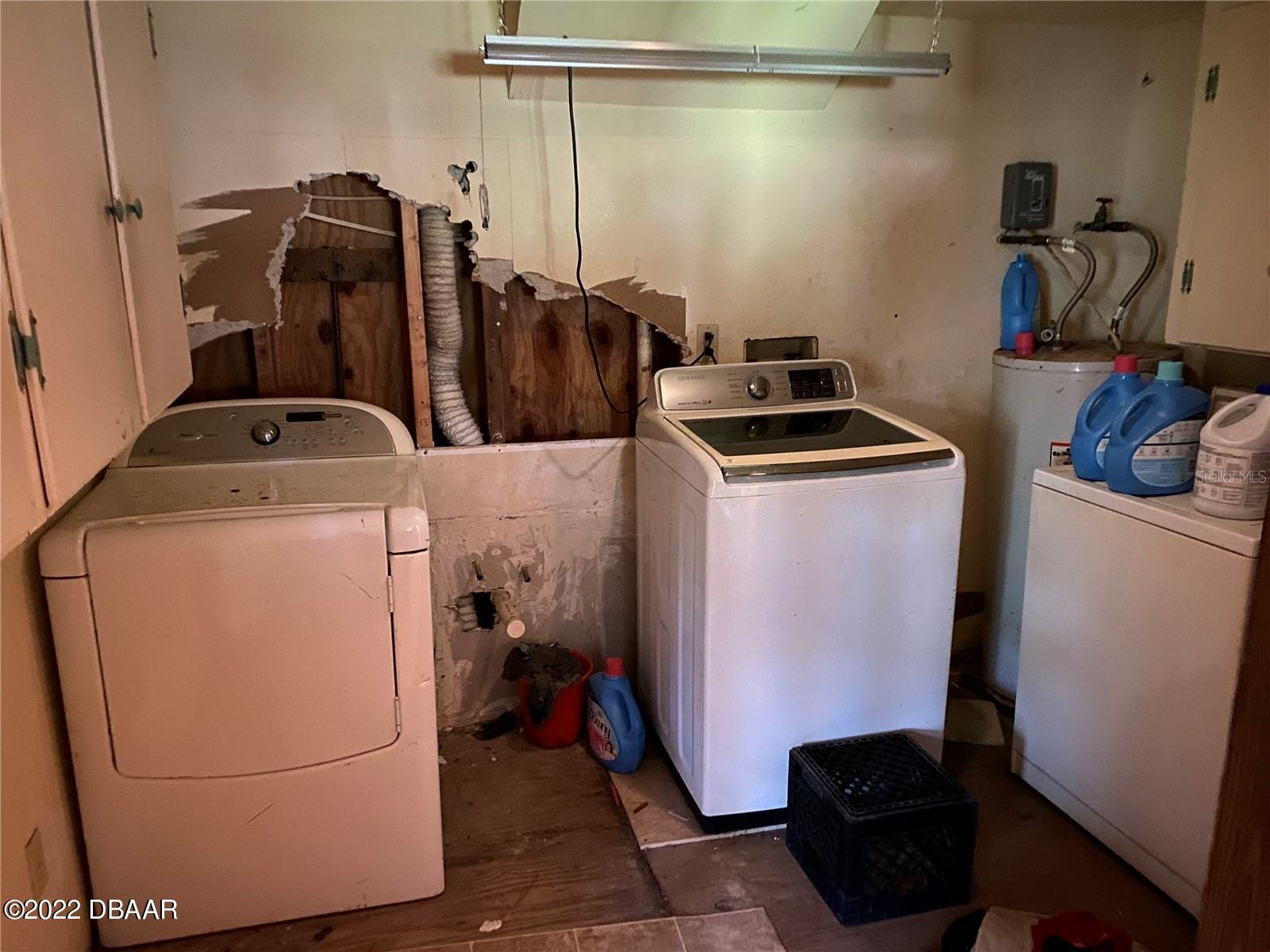4580 Ave D St. Augustine, FL 32095 - Photo 8 of 10 a utility room with dryer and washer
