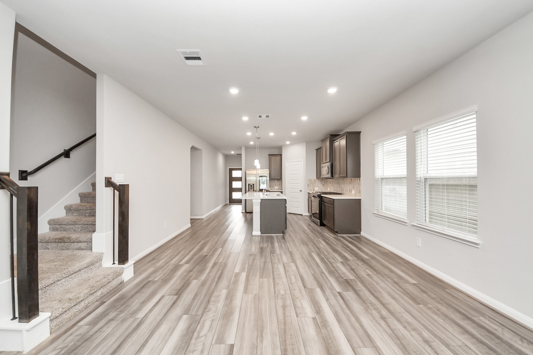 7206 Melrose Lane Rosharon, TX 77583 - Photo 16 of 44 a view of a kitchen with wooden floor