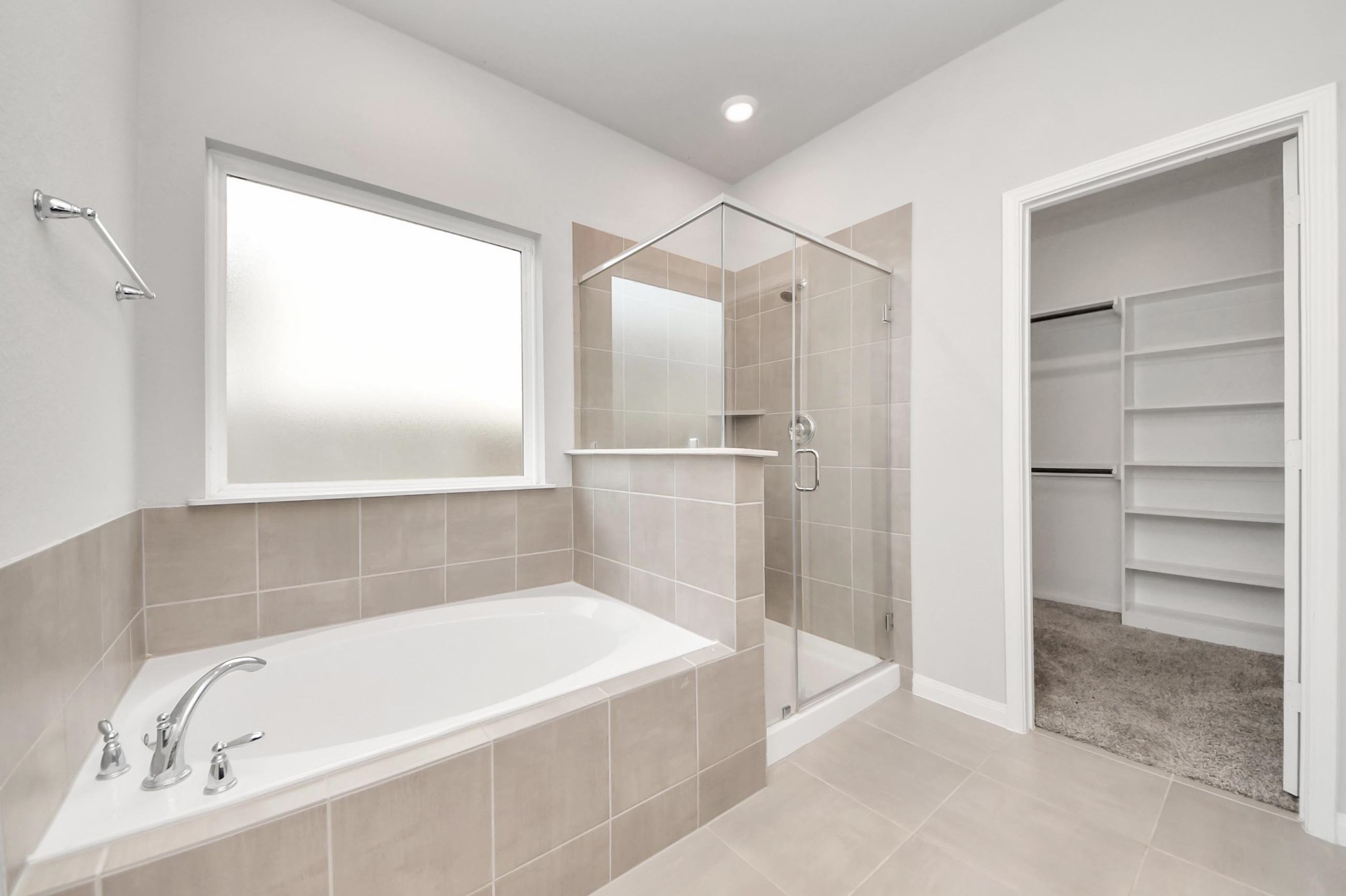 7206 Melrose Lane Rosharon, TX 77583 - Photo 25 of 44 a bathroom with a bathtub and a shower