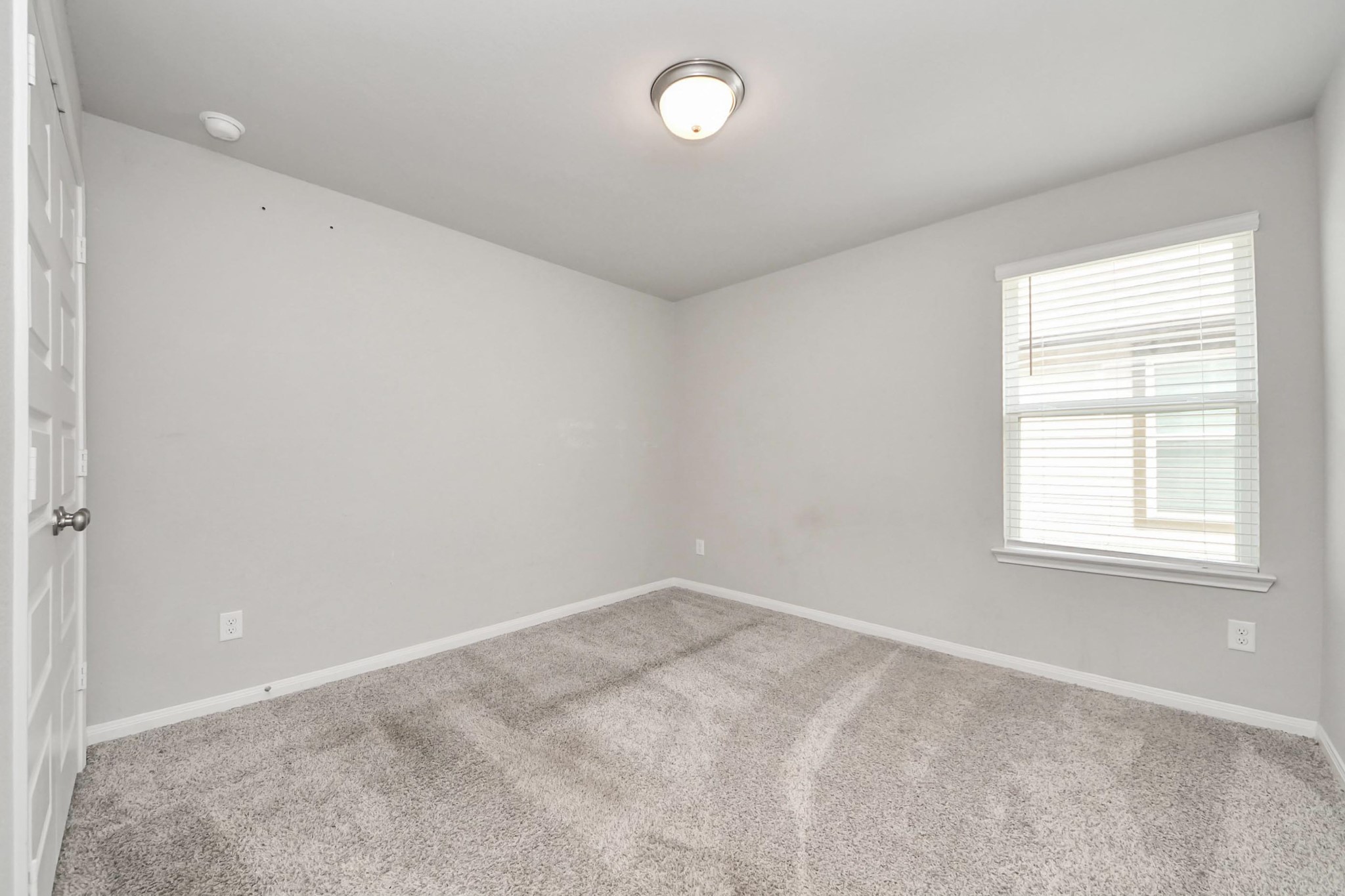 7206 Melrose Lane Rosharon, TX 77583 - Photo 29 of 44 an empty room with a window