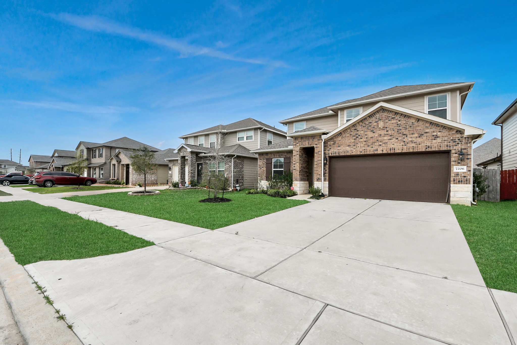 7206 Melrose Lane Rosharon, TX 77583 - Photo 3 of 44 a front view of a house with a yard