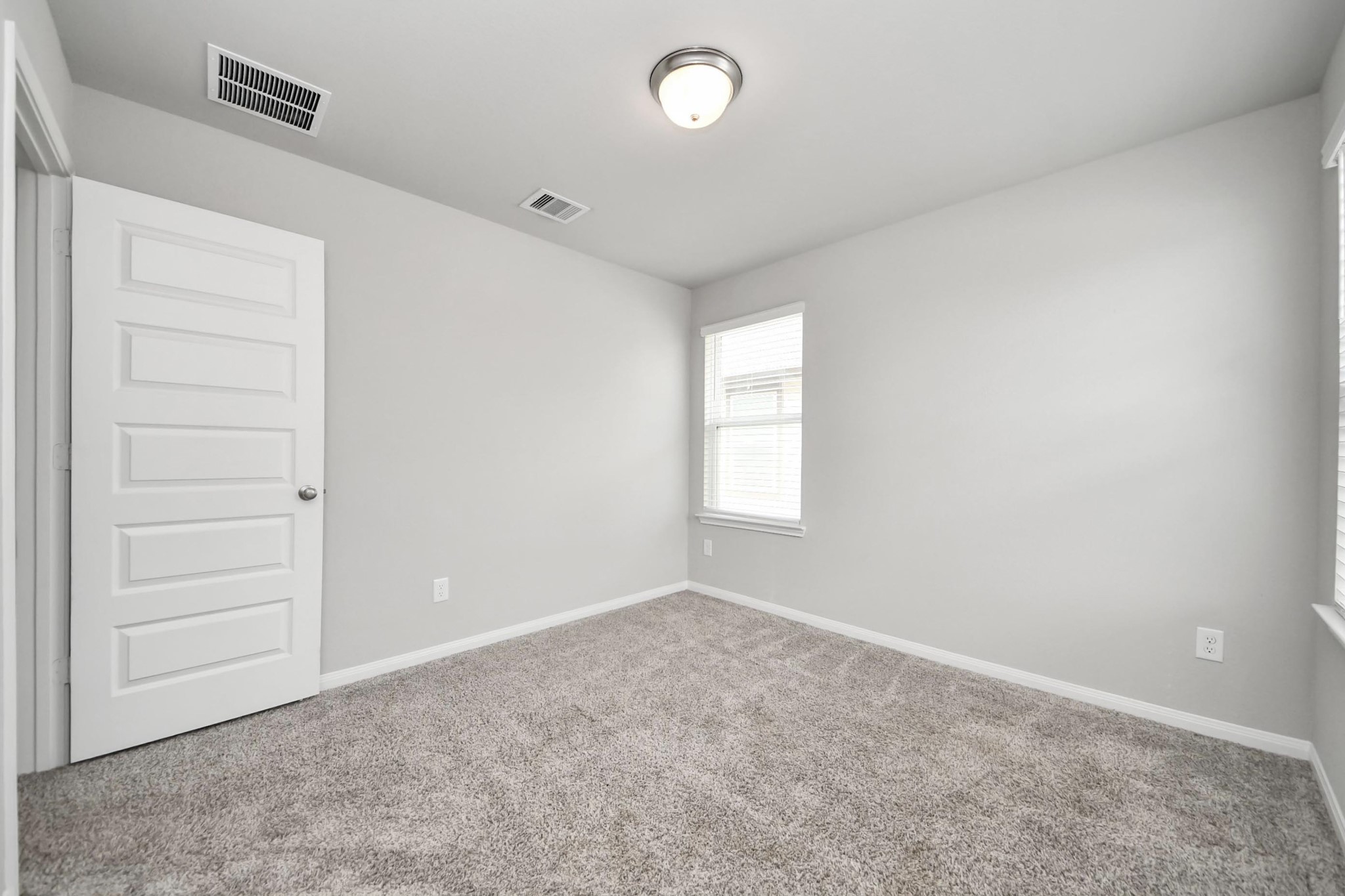 7206 Melrose Lane Rosharon, TX 77583 - Photo 34 of 44 an empty room with windows