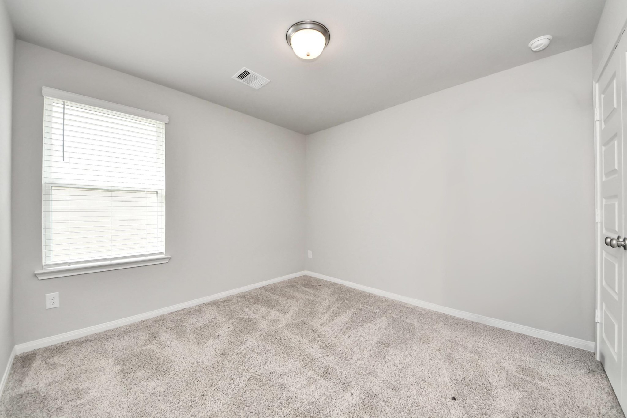 7206 Melrose Lane Rosharon, TX 77583 - Photo 37 of 44 an empty room with a window