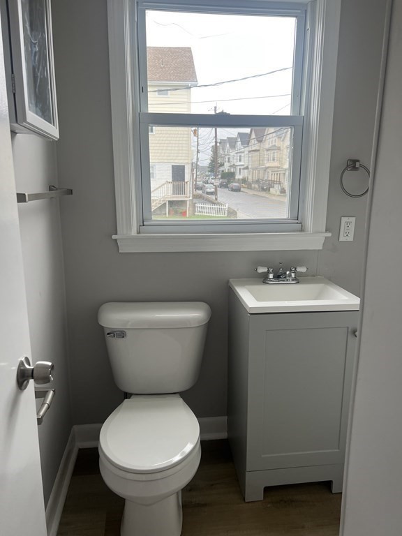 135 Snell Street Fall River, MA 02721 - Photo 11 of 29 a bathroom with a toilet sink and window